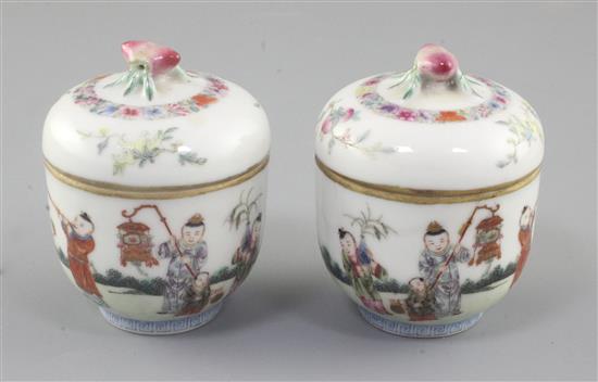 A pair of Chinese famille rose small jars and covers, 19th century, height 8cm
